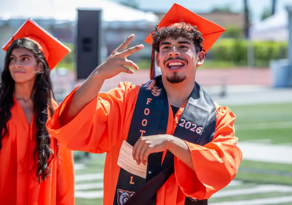 Joshua Flores acknowledges his family in the stands as he...