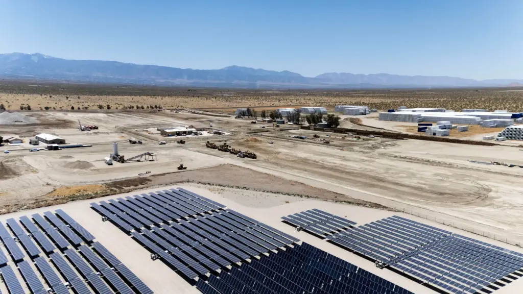 A solar farm, owned by another company, sits on the...