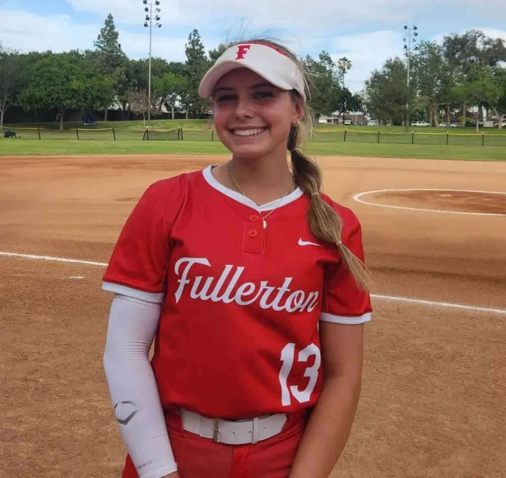 Fullerton’s Hayley Brock (13) drove in the game’s only run...