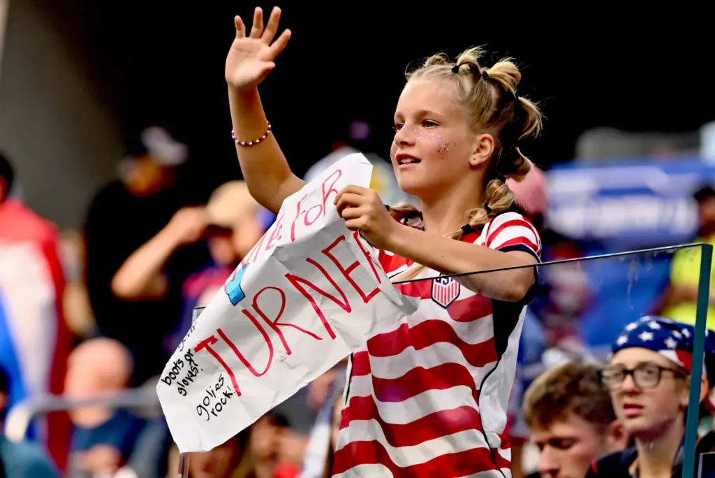 ACameron Turner fan of the United States waves prior to...