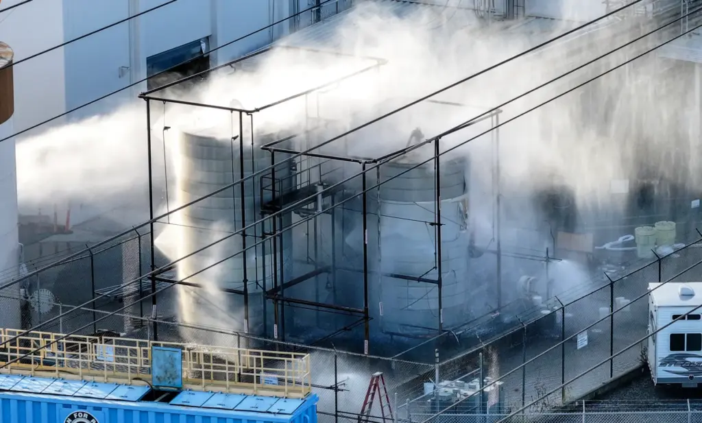 A pressurized tank filled with methyl methacrylate is sprayed with...