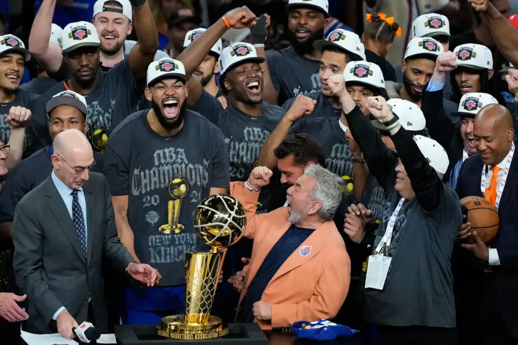 The New York Knicks celebrate with the Larry O’Brien Championship...