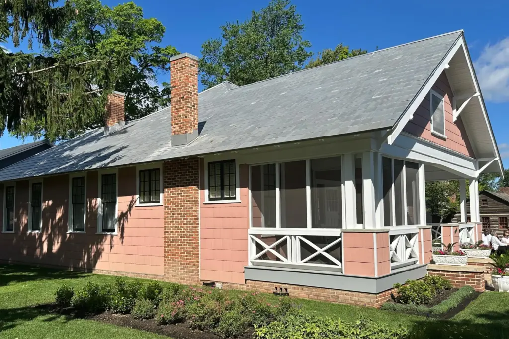 The exterior of the reconstructed Jackson House is seen during...