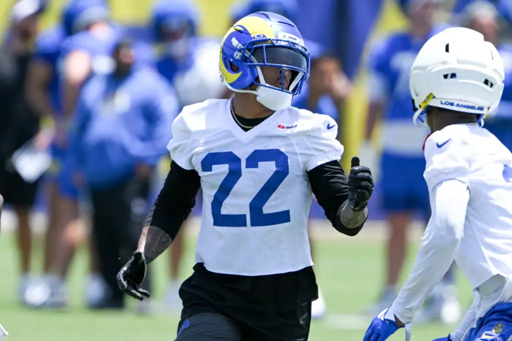 Rams cornerback Trent McDuffie (22) goes through drills during an...