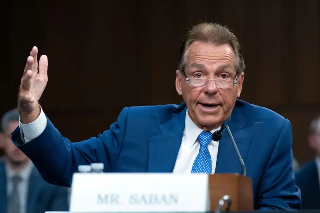 Former University of Alabama football coach Nick Saban testifies before a Senate committee.