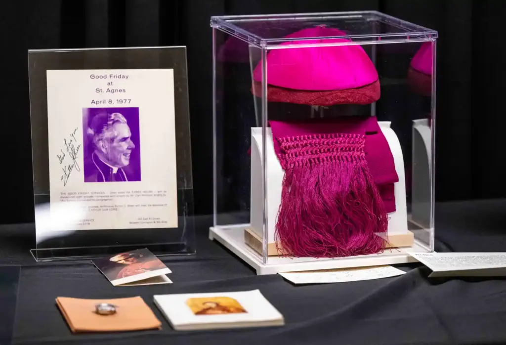 A ceremonial zucchetto, or brimless skullcap, and a fascia, or...