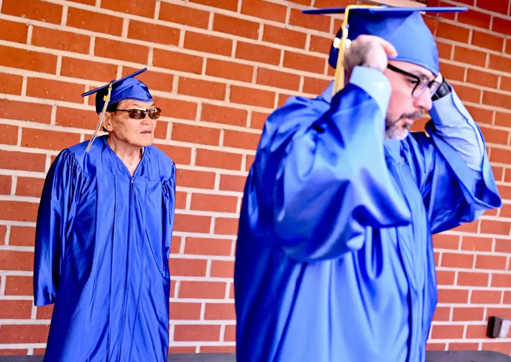 Soo Hak Kwon, 91, lines up with his fellow students...