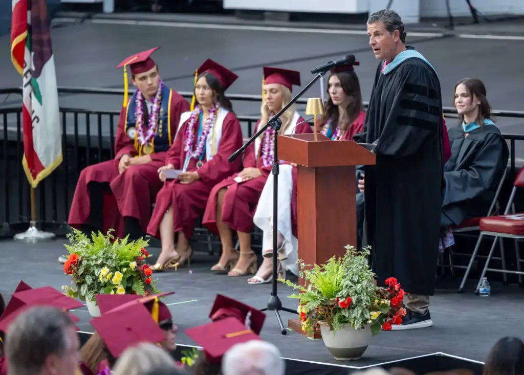 Laguna Beach High School Principal Jason Allemann makes introductions and...