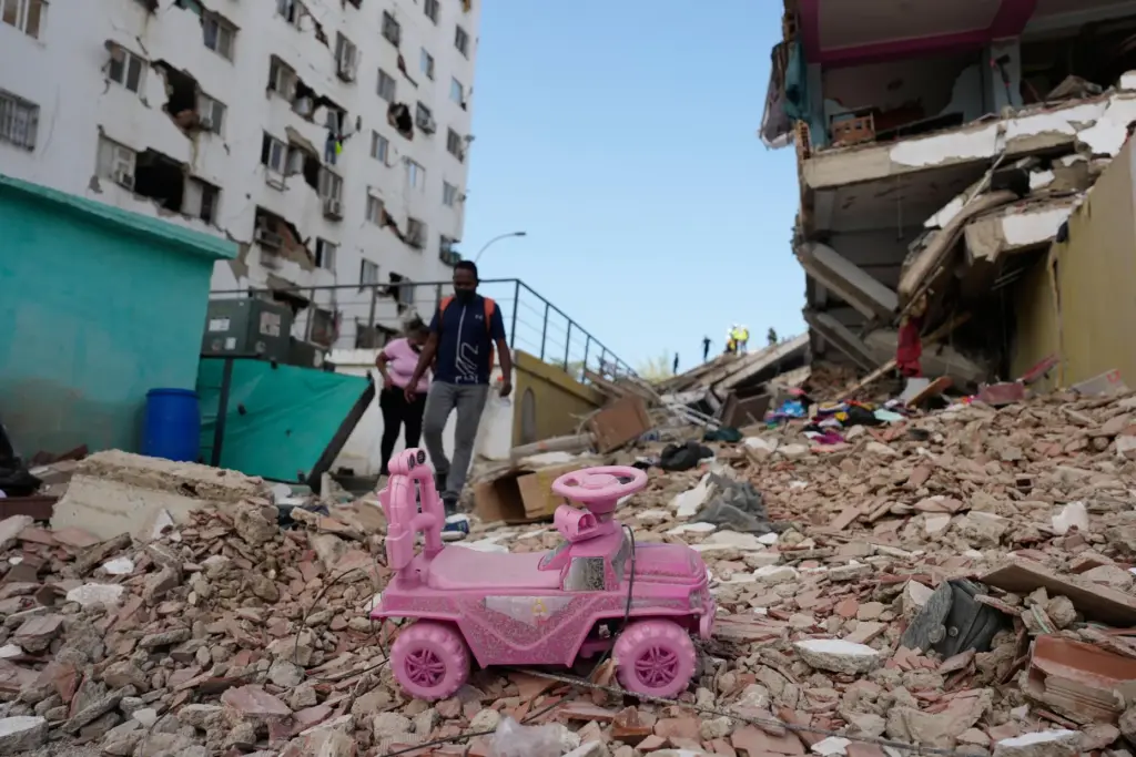 A toy car lies in the rubble two days after earthquakes struck Catia La Mar, Venezuela.