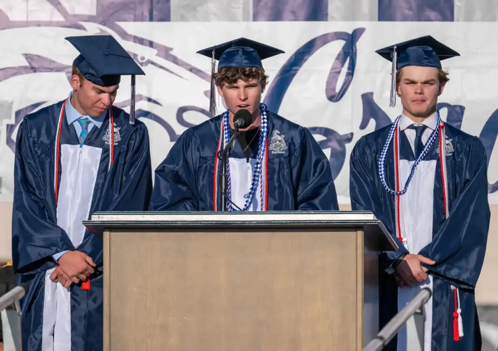 Brady Sugg, Amadeo Miller and Brady Meade, from left, deliver...