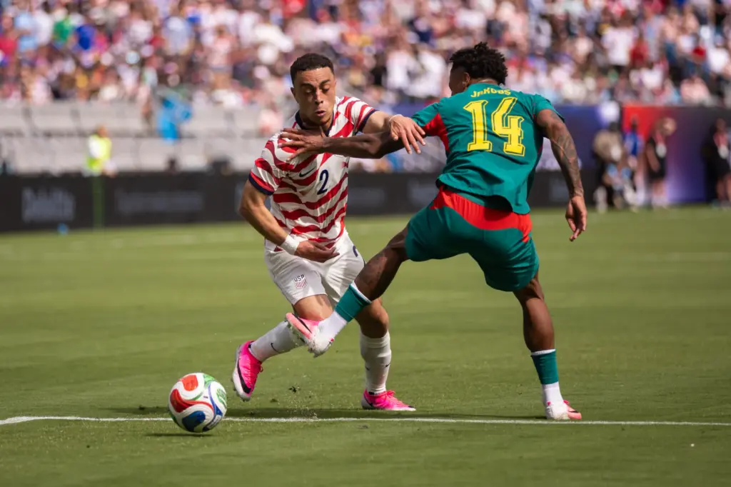 United States defender Sergino Dest (2) battles with Senegal midfielder...
