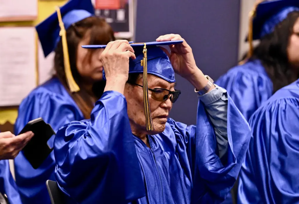 Soo Hak Kwon, 91, prepares for his graduation as he...
