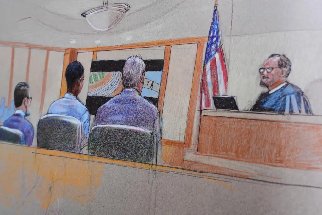 A courtroom sketch, provided by Pat Lopez shows Karmelo Anthony,...