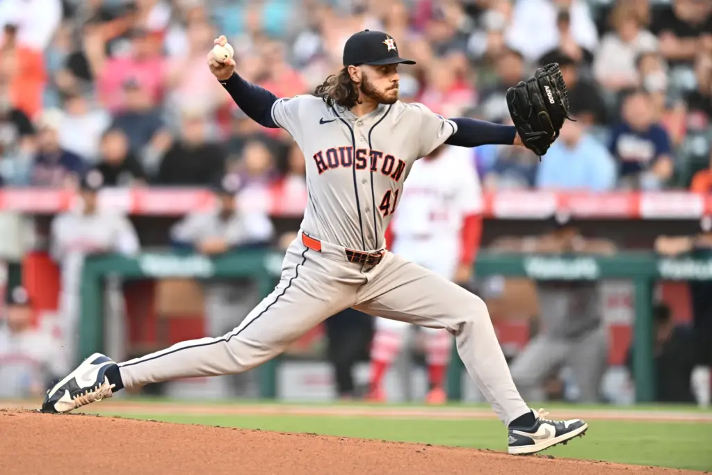 Houston Astros starting pitcher Spencer Arrighetti throws to the plate...