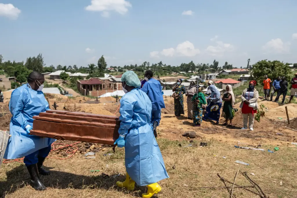 Red Cross workers prepare to bury Vanisa Anifa, a 6-month-old...