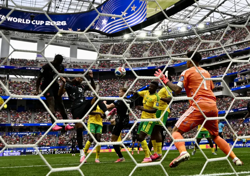 Canada defender Derek Cornelius (13) misses with the shot on...