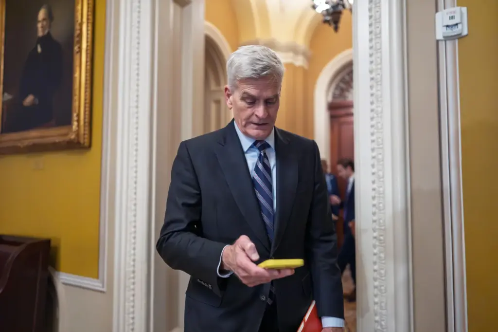 Sen. Bill Cassidy, R-La., heads to a closed-door Republican policy meeting.