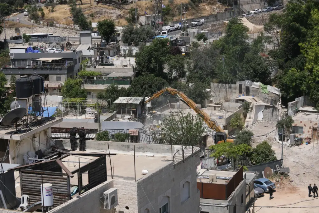 Israeli authorities demolish a Palestinian home in the Silwan neighborhood of east Jerusalem.