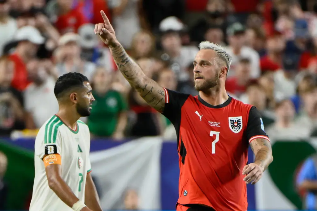 Austria’s Marko Arnautovic (7) celebrates his team’s first goal during...