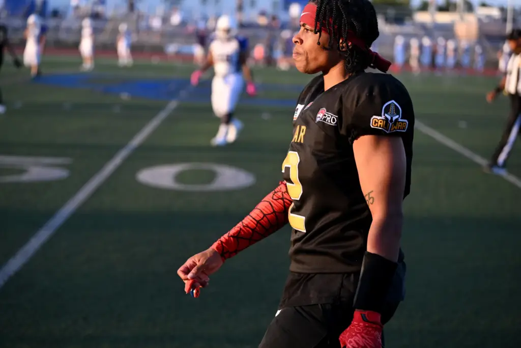 Cali War defensive back Sonfre Roberson walks off the field...