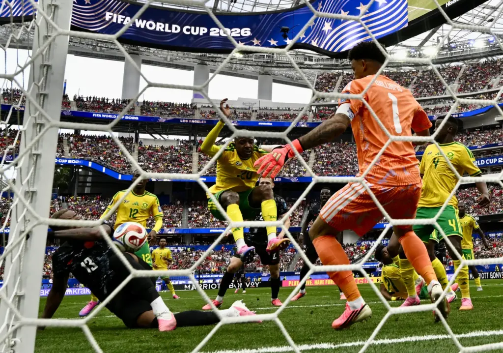 Canada defender Derek Cornelius (13) misses with the shot on...