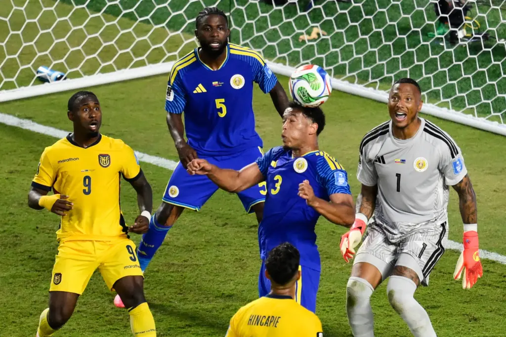 CuraÃ§ao’s Jurien Gaari (3) heads the ball away on a...