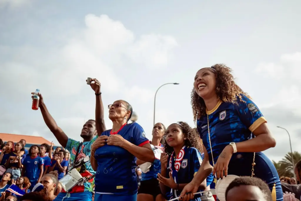 Fans react as they watch a broadcast of the Spain-Cape Verde World Cup match.