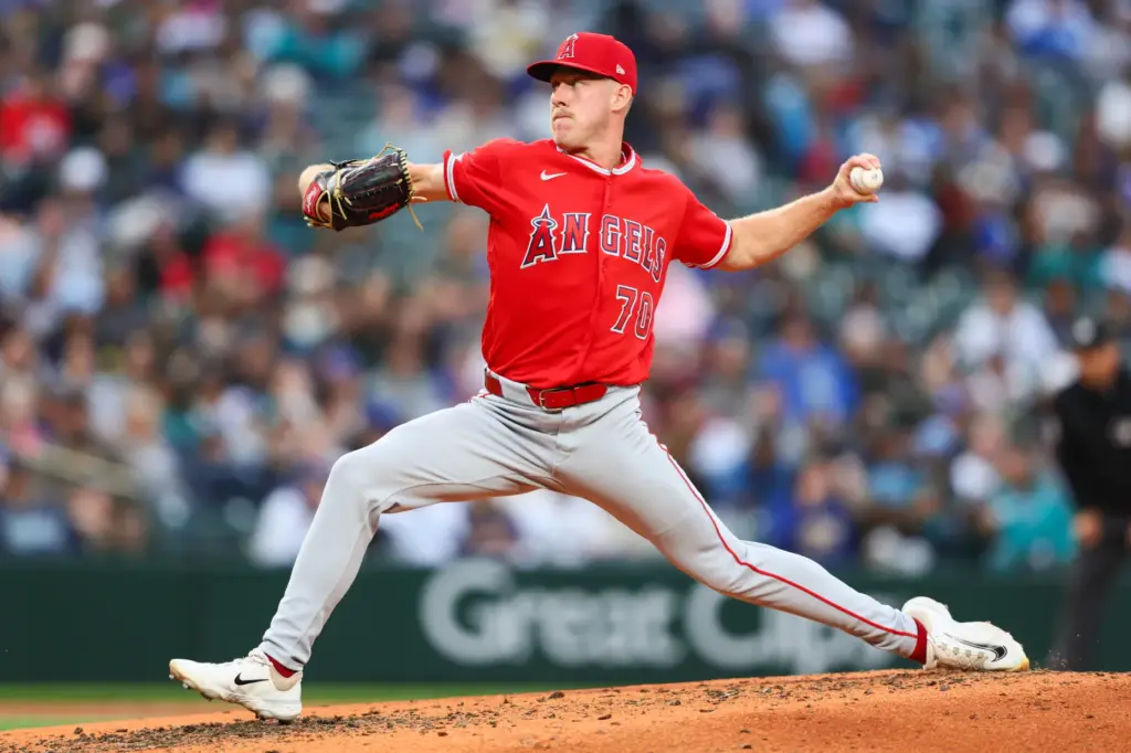 Angels relief pitcher Mitch Farris throws to the plate during...
