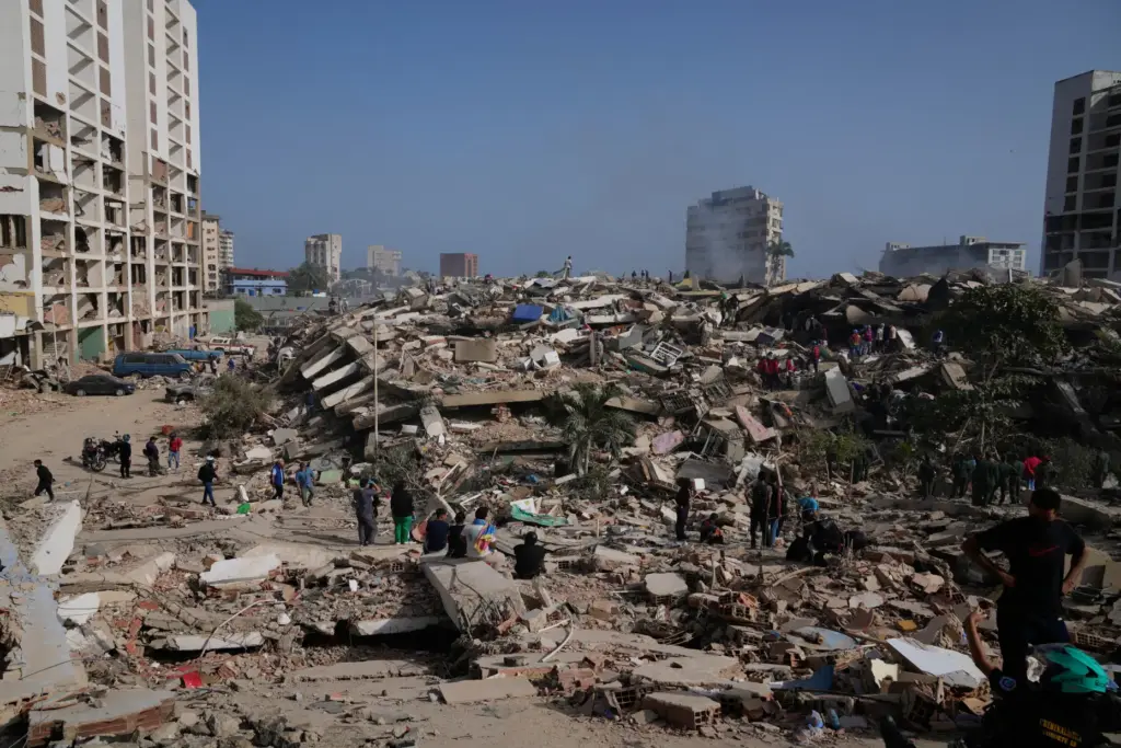 People search through the rubble two days after an earthquake...