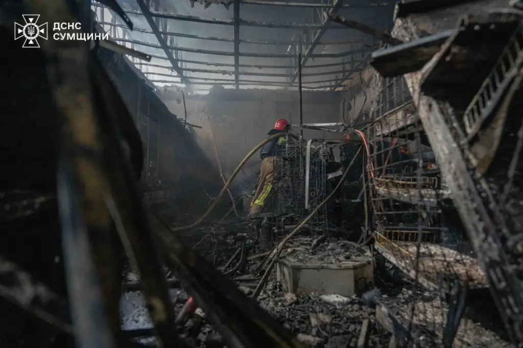 Firefighters extinguish a fire in a gas station following a Russian air attack in Sumy, Ukraine.