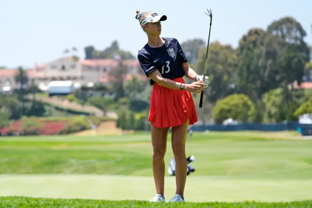 Nelly Korda reacts to her shot on the first green...