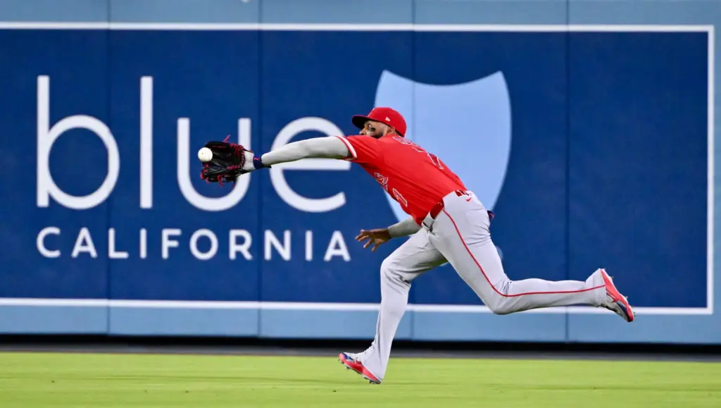 Right fielder Jo Adell #7 of the Angels makes a...