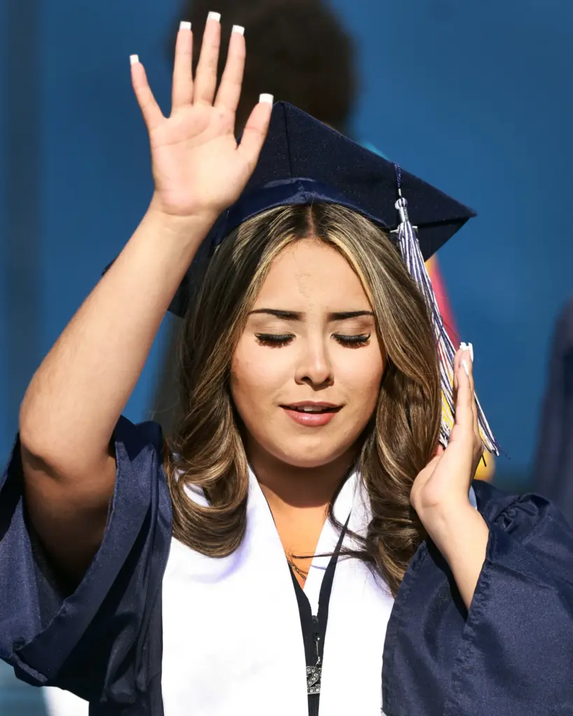 Jade Alejos jokes around with her friends as she breaks...