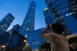 Small aircraft crashes into Beijing’s tallest building, according to flight tracking service