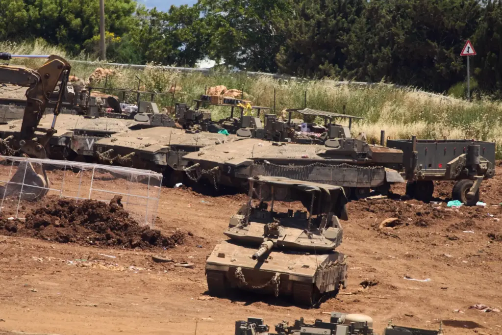 Israeli troops gather on the border with Lebanon in northern...
