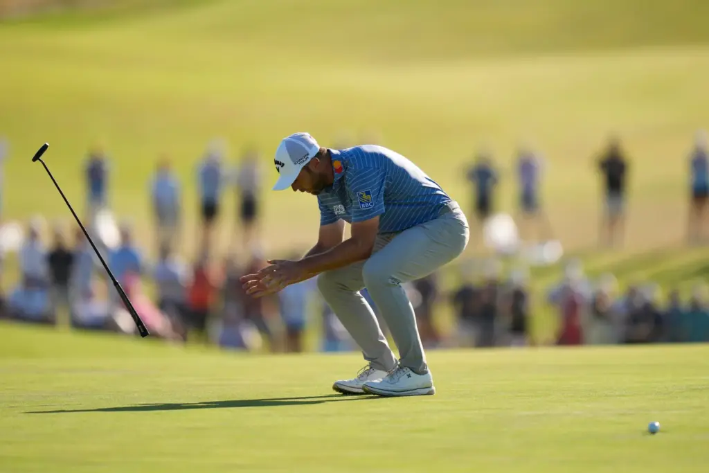 Sam Burns celebrates after a birdie on the 16th hole...