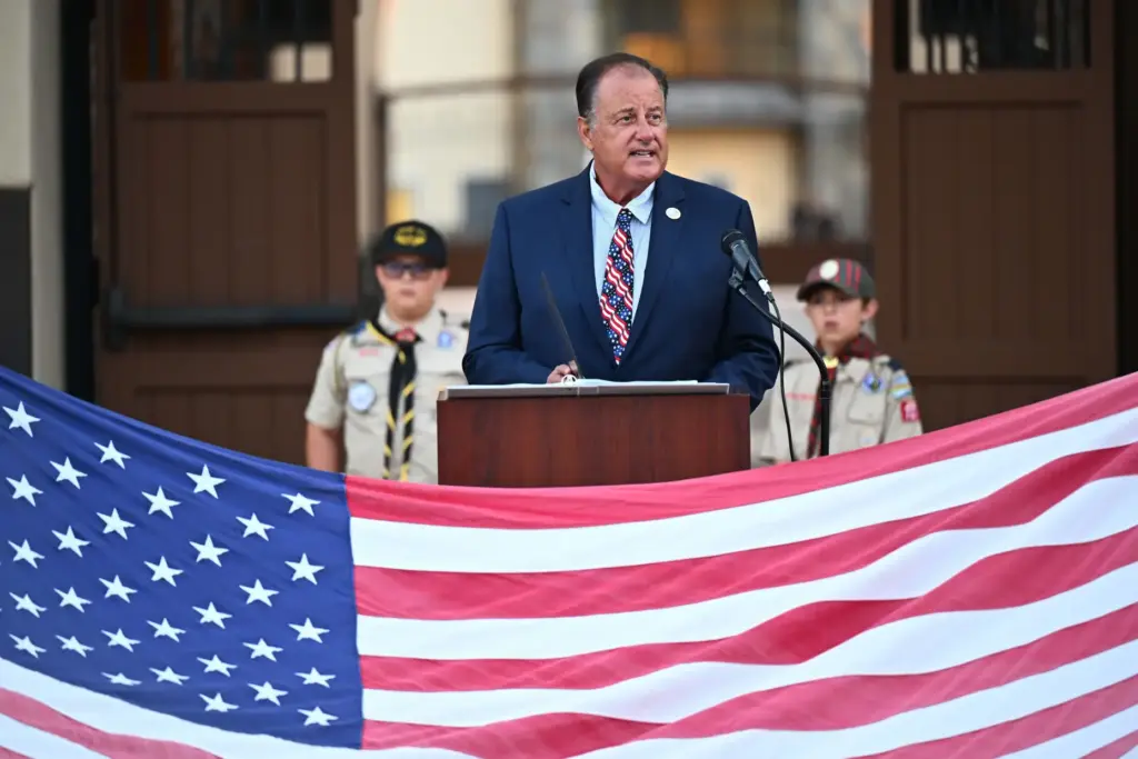 Rancho Santa Margarita Mayor Tony Beall speaks during an American...