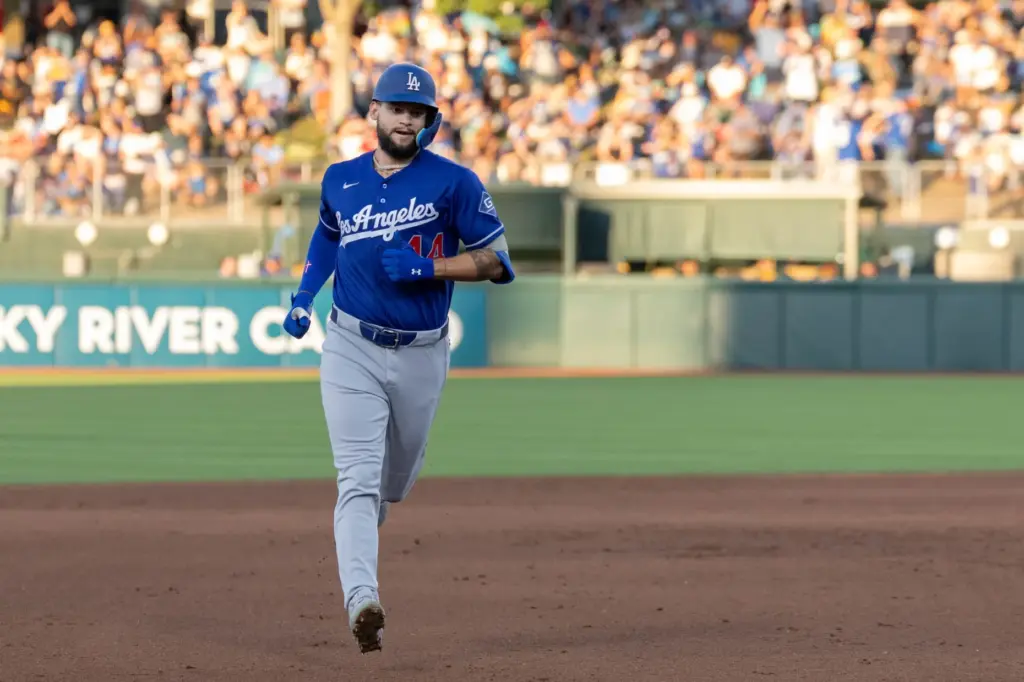 The Dodgers’ Andy Pages runs the bases after hitting a...