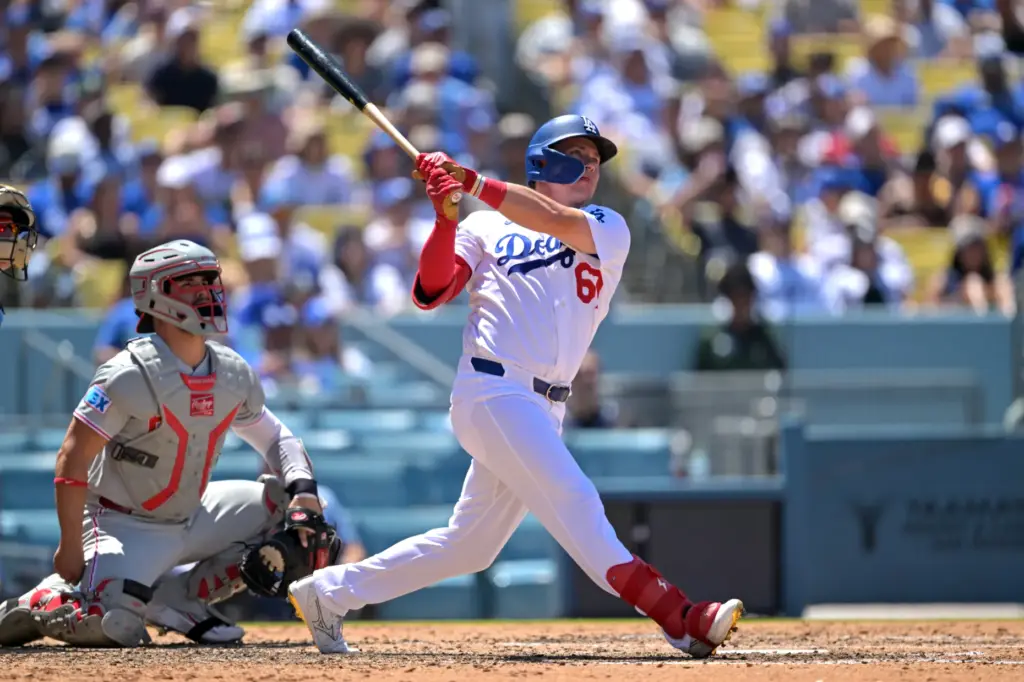 Dodgers Ryan Ward (67) hits a home run during the...