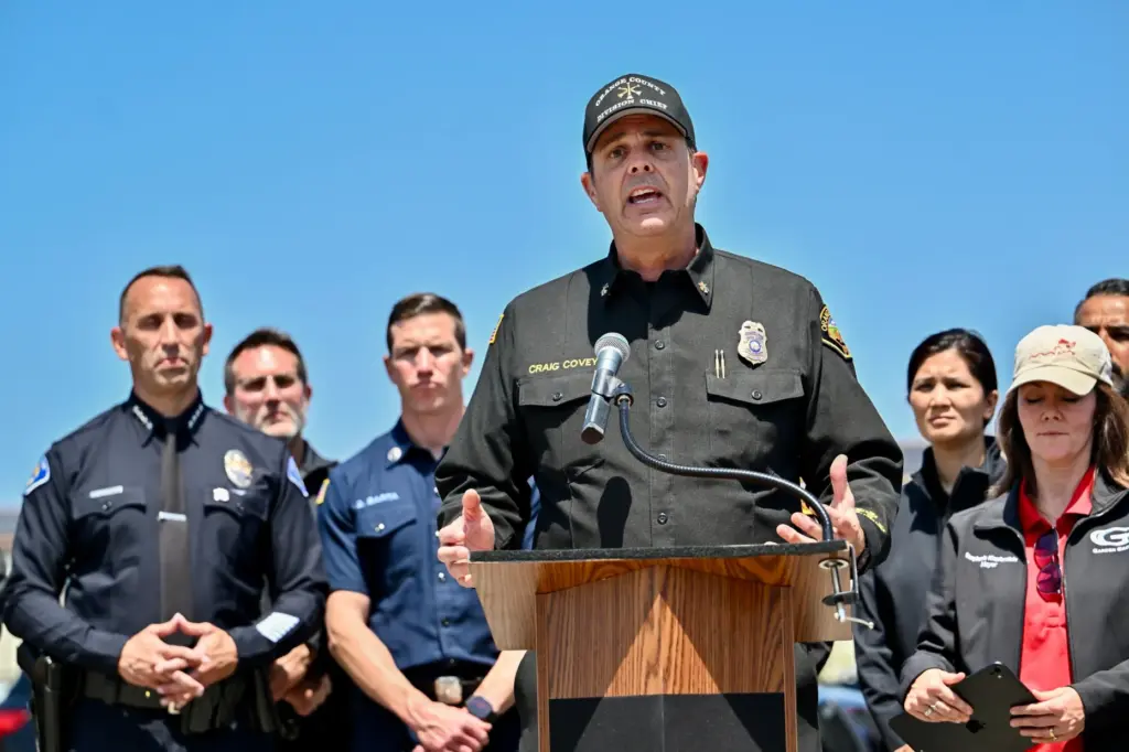 Orange County Fire Authority Division Chief Craig Covey speaks during...