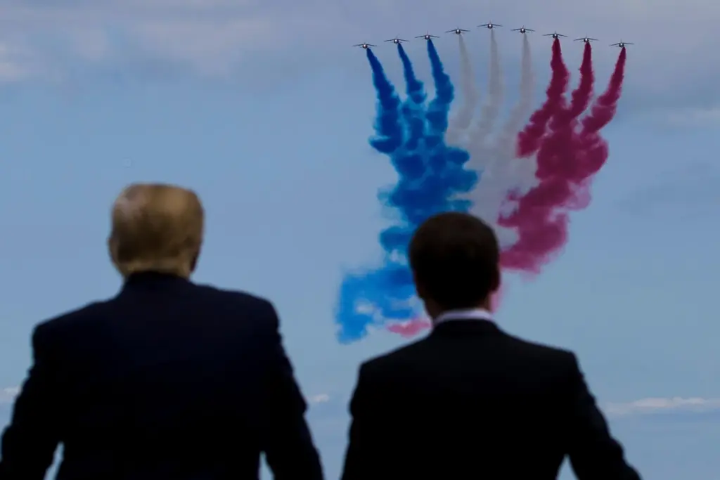 FILE – President Donald Trump, left, and French President Emmanuel...