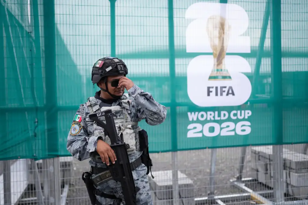 A National Guard officer stands guard outside a Guadalajara stadium hosting World Cup matches.