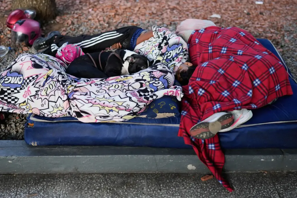 People sleep in the streets a day after an earthquake...