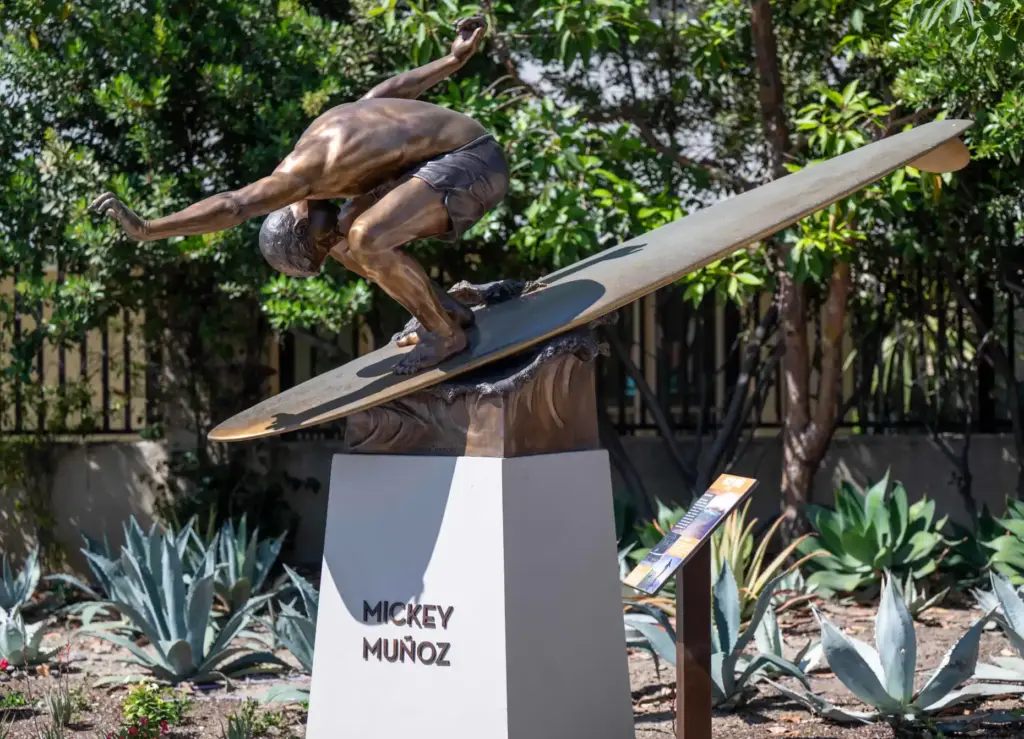 A life-sized bronze statue, by artist Bill Limebrook, depicts longtime...