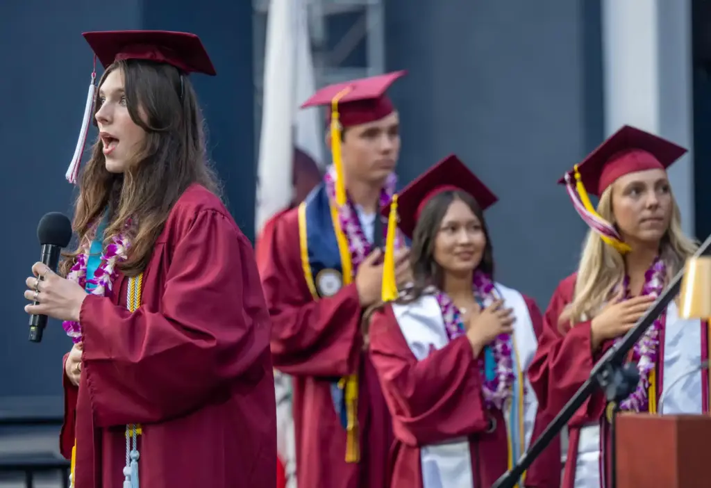 Isabella Badran sings the National Anthem during the Laguna Beach...