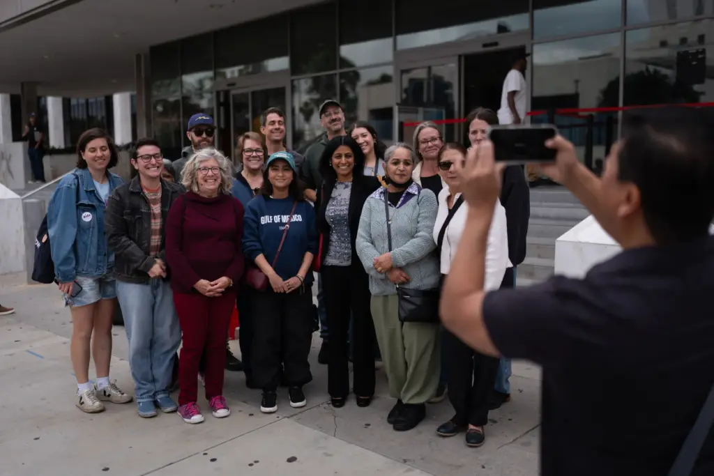 Masuma Khan (second from right in the front row) and...