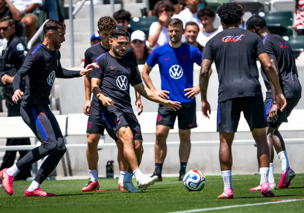 U.S. Menâs National Team member Christian Roldan, kicking the ball,...