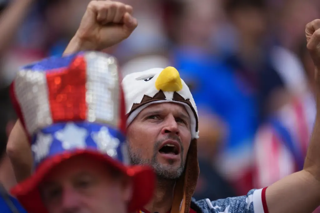 A U.S. fan cheers before the World Cup Group D...