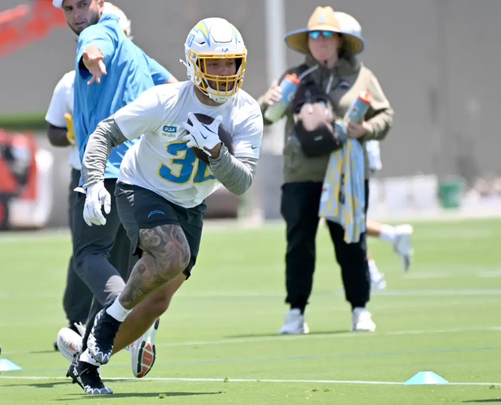 Chargers fullback Alec Ingold (30) carries the ball during team...