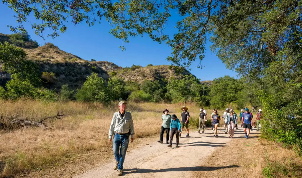 Ron Vanderhoff of the California Native Plant Society, left, leads...